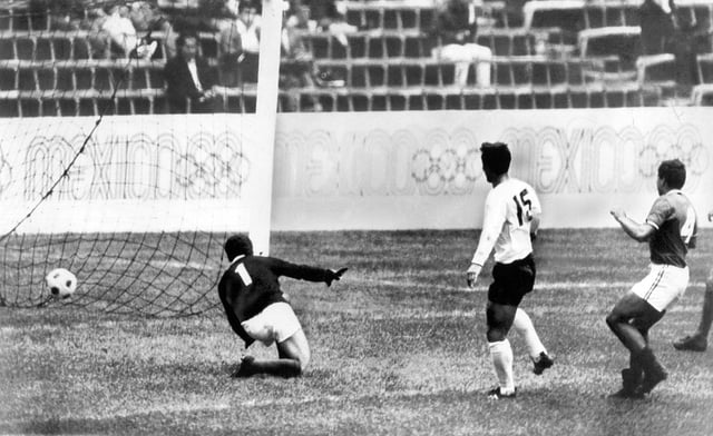 FILE - Japan's Kunishige Kamamoto scores a goal against the Mexican team at Mexico's Azteca Stadium on Oct. 24, 1968. (AP Photo, file)