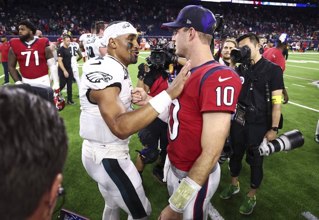 Nov 3, 2022; Houston, Texas, USA; Philadelphia Eagles quarterback Jalen Hurts (1) talks with Houston Texans quarterback Davis Mills (10) after the game at NRG Stadium. Mandatory Credit: Troy Taormina-USA TODAY Sports/File Photo