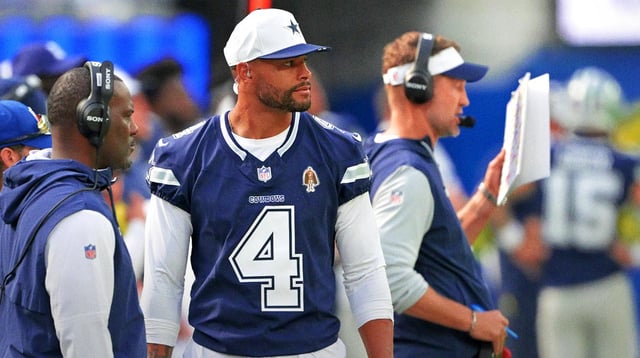 Aug 9, 2025; Inglewood, California, USA; Dallas Cowboys quarterback Dak Prescott (4) looks on from the sidelines during the game against the Los Angeles Rams at SoFi Stadium. Mandatory Credit: Jayne Kamin-Oncea-Imagn Images