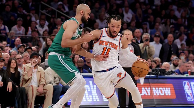 May 16, 2025; New York, New York, USA; New York Knicks guard Jalen Brunson (11) drives to the basket against Boston Celtics guard Derrick White (9) during the second quarter of game six in the second round of the 2025 NBA Playoffs at Madison Square Garden. Mandatory Credit: Brad Penner-Imagn Images