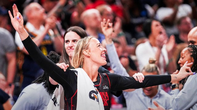 Indiana Fever guard Sophie Cunningham (8) and Indiana Fever guard Caitlin Clark (22) celebrate from the bench Saturday, Aug. 9, 2025, during a game between the Indiana Fever and the Chicago Sky at Gainbridge Fieldhouse in Indianapolis.
