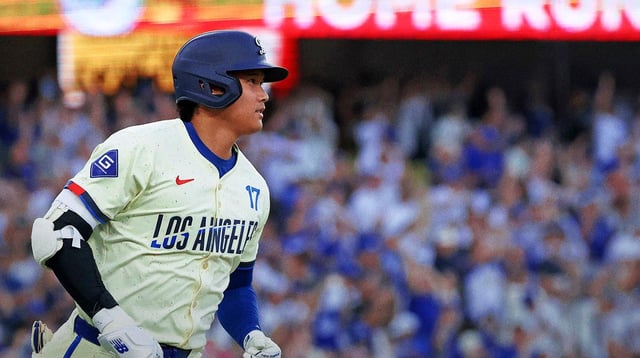 Aug 9, 2025; Los Angeles, California, USA; Los Angeles Dodgers designated hitter Shohei Ohtani (17) hits a home run during the fifth inning against Toronto Blue Jays starting pitcher Chris Bassitt (40) at Dodger Stadium. Mandatory Credit: Kiyoshi Mio-Imagn Images