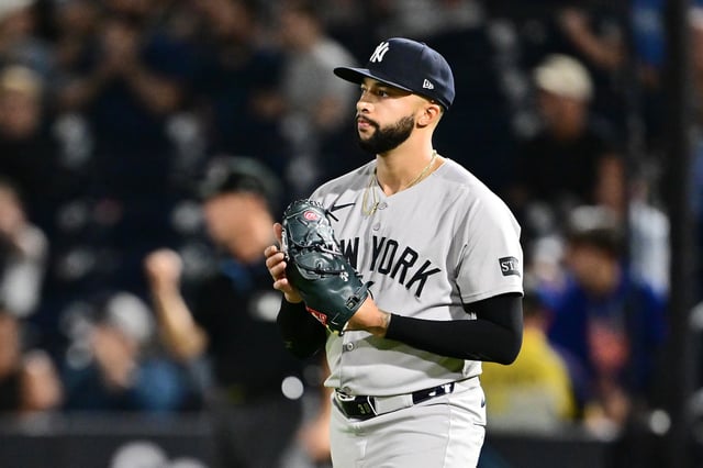 TAMPA, FLORIDA - APRIL 17: Devin Williams #38 of the New York Yankees reacts in the ninth inning against the Tampa Bay Rays at George M. Steinbrenner Field on April 17, 2025 in Tampa, Florida. (Photo by Julio Aguilar/Getty Images)