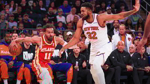 Jan 20, 2025; New York, New York, USA; Atlanta Hawks guard Trae Young (11) is guarded by New York Knicks center Karl-Anthony Towns (32) during the second half at Madison Square Garden. Mandatory Credit: Vincent Carchietta-Imagn Images