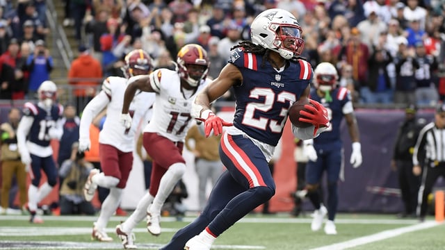 Nov 5, 2023; Foxborough, Massachusetts, USA; New England Patriots safety Kyle Dugger (23) runs the ball out of the end zone after an interception during the first half against the Washington Commanders at Gillette Stadium. Mandatory Credit: Bob DeChiara-Imagn Images
