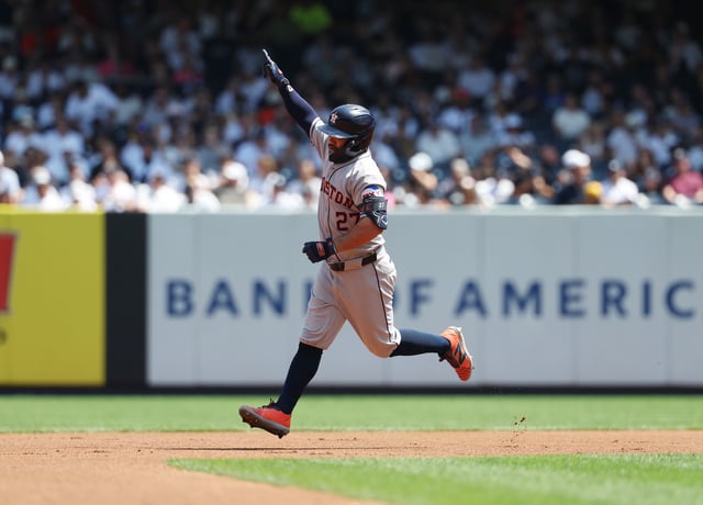 NEW YORK, NEW YORK - AUGUST 10: Jose Altuve #27 of the Houston Astros rounds the bases after hitting a solo home run against Max Fried #54 of the New York Yankees in the first inning during their game at Yankee Stadium on August 10, 2025 in New York City. (Photo by Al Bello/Getty Images)
