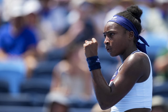 Aug 10, 2025; Cincinnati, OH, USA;  Coco Gauff (USA) reacts after returning a shot against Wang Xinyu (CHN) during the Cincinnati Open at the Lindner Family Tennis Center. Mandatory Credit: Aaron Doster-Imagn Images