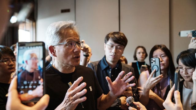 Nvidia CEO Jensen Huang speaks to the press in Beijing. Photo: Na Bian/Bloomberg via Getty Images