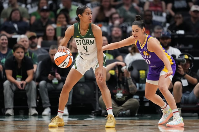 Skylar Diggins #4 of the Seattle Storm handles the ball against Kelsey Plum #10 of the Los Angeles Sparks during the first half at Climate Pledge Arena on August 01, 2025, in Seattle, Washington.