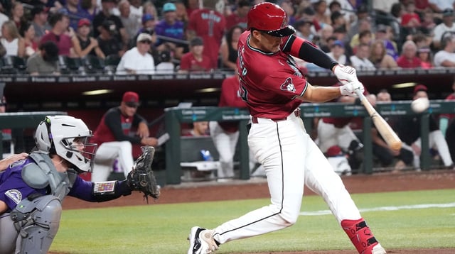 Arizona Diamondbacks&#39; Connor Kaiser (65) hits a double for his first major league hit against the Colorado Rockies at Chase Field on Aug. 10, 2025. © Joe Rondone/The Republic / USA TODAY NETWORK via Imagn Images