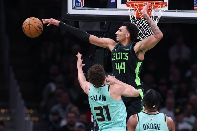 Apr 13, 2025; Boston, Massachusetts, USA; Boston Celtics forward Miles Norris (44) blocks Charlotte Hornets forward Tidjane Salaun (31) during the first half at TD Garden. Mandatory Credit: Paul Rutherford-Imagn Images/File Photo