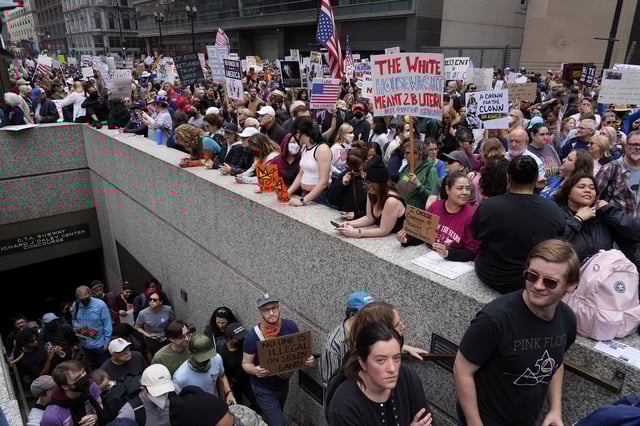Demonstrators take part in the "No Kings Day" protest on June 14 in Chicago.