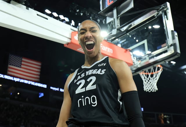 A&#39;ja Wilson #22 of the Las Vegas Aces reacts after scoring a basket and drawing a foul against the Seattle Storm in the second quarter of their game at Michelob ULTRA Arena on August 08, 2025 in Las Vegas, Nevada.