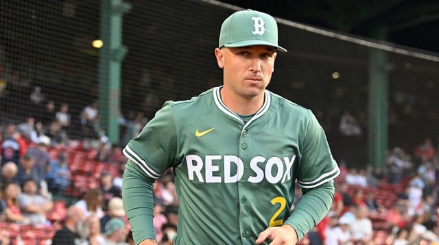 May 16, 2025; Boston, Massachusetts, USA; Boston Red Sox third baseman Alex Bregman (2) runs out of the dugout before the start of a game against the Atlanta Braves at Fenway Park. Mandatory Credit: Eric Canha-Imagn Images