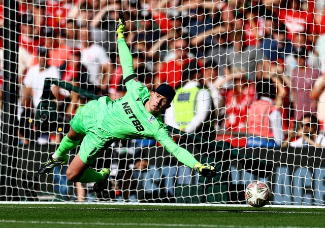 Soccer Football - FA Community Shield - Crystal Palace v Liverpool - Wembley Stadium, London, Britain - August 10, 2025 Crystal Palace's Dean Henderson in action as he saves a penalty during the penalty shootout from Liverpool's Alexis Mac Allister Action Images via Reuters/Matthew Childs