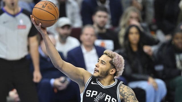 Mar 27, 2025; Cleveland, Ohio, USA; San Antonio Spurs forward Jeremy Sochan (10) drives to the basket in the fourth quarter against the Cleveland Cavaliers at Rocket Arena. Mandatory Credit: David Richard-Imagn Images
