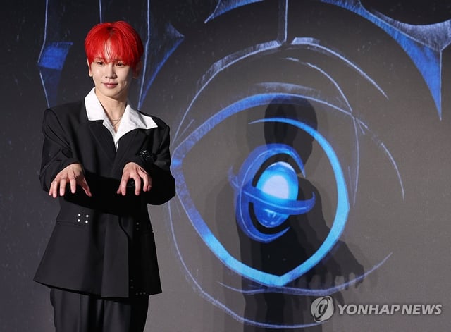 SHINee's Key poses during a press conference to mark the release of his third solo full-length album, "Hunter," at a Seoul hotel on Aug. 11, 2025. (PHOTO NOT FOR SALE) (Yonhap)