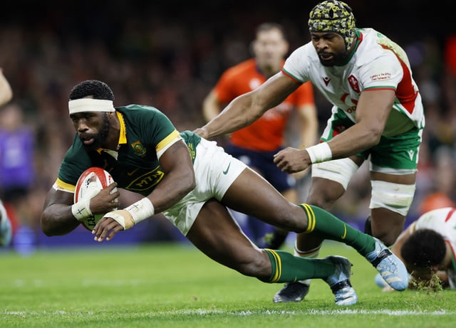 Rugby Union - Autumn Internationals - Wales v South Africa - Principality Stadium, Cardiff, Wales, Britain - November 23, 2024 South Africa's Siya Kolisi scores their fourth try Action Images via Reuters/Peter Cziborra/File Photo