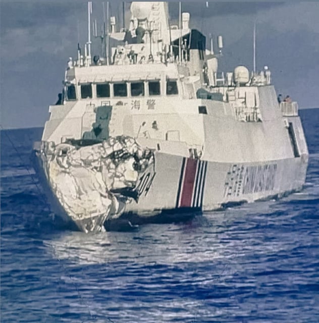 A Chinese coastguard vessel is pictured on Monday in the South China Sea after an apparent collision with another Chinese ship. Photo: Philippine Coast Guard