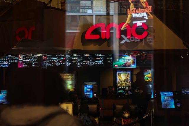 An AMC logo is displayed at a theatre in Manhattan in New York City, U.S., February 25, 2025. REUTERS/Jeenah Moon/File Photo