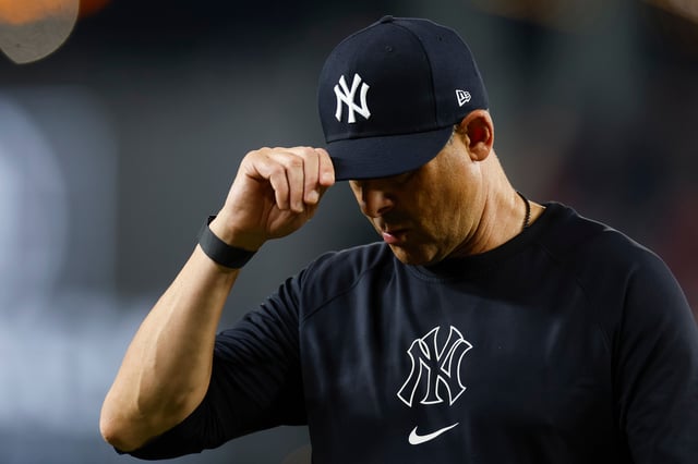 WASHINGTON, DC - AUGUST 28: Aaron Boone #17 of the New York Yankees walks back to the dugout after a pitching change in the sixth inning against the Washington Nationals at Nationals Park on August 28, 2024 in Washington, DC. (Photo by Brandon Sloter/Image Of Sport/Getty Images)
