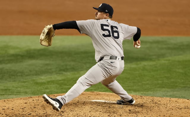 ARLINGTON, TX - AUGUST 6: Mark Leiter Jr. #56 of the New York Yankees pitches against the Texas Rangers during the sixth inning at Globe Life Field on August 6, 2025 in Arlington, Texas.