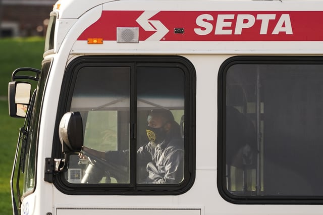 FILE - A Southeastern Pennsylvania Transportation Authority bus (SEPTA) is driven on Market Street in Philadelphia, Oct. 22, 2021. (AP Photo/Matt Rourke, File)