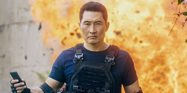 Daniel Dae Kim walking away from an explosion in Butterfly