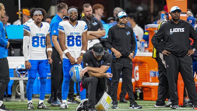 Aug 8, 2025; Atlanta, Georgia, USA; Detroit Lions head coach Dan Campbell reacts on the field after an injury to safety Morice Norris (26) (not shown) during the game against the Atlanta Falcons at Mercedes-Benz Stadium. Mandatory Credit: Dale Zanine-Imagn Images