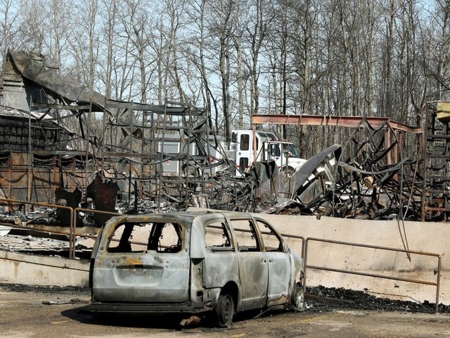  Wildfire damage is visible at the Ukrainian Cultural Heritage Village, in Lamont County east of Edmonton, April 19, 2025.