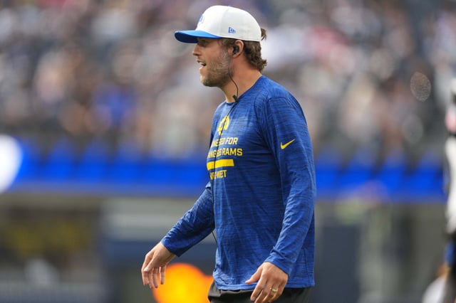 Aug 9, 2025; Inglewood, California, USA;  Los Angeles Rams quarterback Matthew Stafford watches from the sidelines during the first half against the Dallas Cowboys at SoFi Stadium. Mandatory Credit: Kirby Lee-Imagn Images