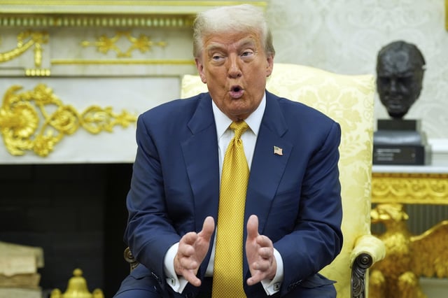 President Donald Trump talks in the Oval Office of the White House, Tuesday, July 22, 2025, in Washington.