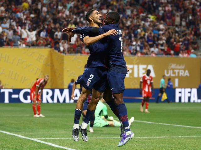 Soccer Football - FIFA Club World Cup - Quarter Final - Paris St Germain v Bayern Munich - Mercedes-Benz Stadium, Atlanta, Georgia, U.S. - July 5, 2025
Paris St Germain's Ousmane Dembele celebrates scoring their second goal with Achraf Hakimi REUTERS/Kai Pfaffenbach     TPX IMAGES OF THE DAY