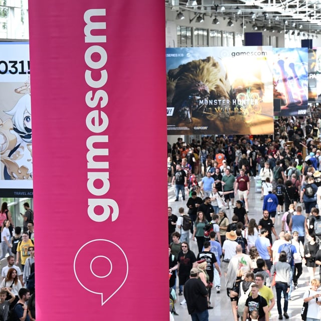 A photo shows visitors at the Gamescom video games trade fair in Cologne, western Germany