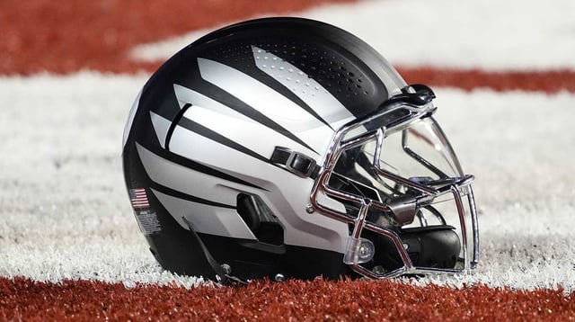 Nov 16, 2024; Madison, Wisconsin, USA; General view of a Oregon Ducks helmet during warmups prior to to the game against the Wisconsin Badgers at Camp Randall Stadium. Mandatory Credit: Jeff Hanisch-Imagn Images