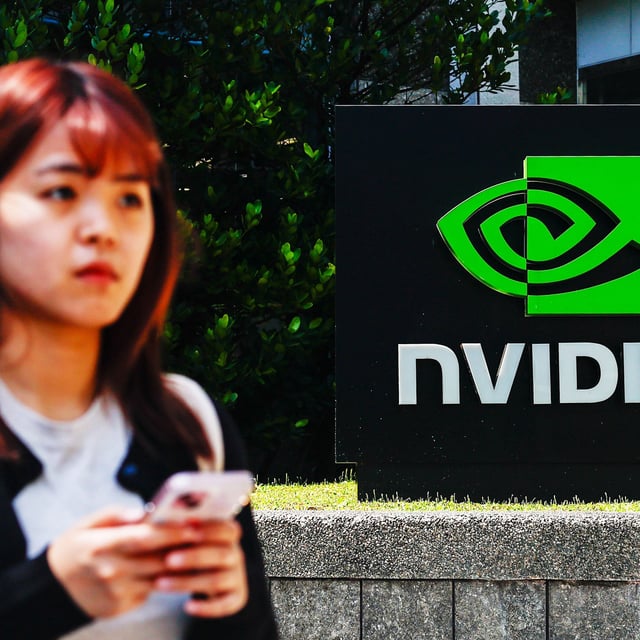 TAIPEI, TAIWAN - APRIL 16: The logo of NVIDIA, an American tech company which designs and supplies GPUs, APIs, and Artificial Intelligence (AI) software and hardware, in Taipei, Taiwan, on April 16, 2025. The United States President Donald Trump's administration has confirmed that tariffs on semiconductors and some other technology products will 'take place in the very near future'. With tariffs and export restrictions expected to be implemented by the American government, electronic products such as iPhone, smartphones, tablet, computer and other digital devices requiring advanced microchips, as well as such global supply chain are likely to be affected. (Photo by Daniel Ceng/Anadolu via Getty Images)