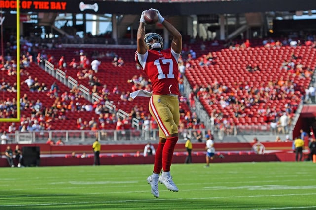 San Francisco 49ers quarterback Carter Bradley (17) or Jordan Watkins (17) reaches for a pass during warm-ups before their NFL preseason game at Levi’s Stadium in Santa Clara, Calif., on Saturday, Aug. 9, 2025. (Jose Carlos Fajardo/Bay Area News Group)