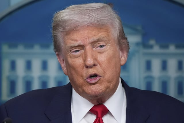 President Donald Trump speaks with reporters in the James Brady Press Briefing Room at the White House, Monday, Aug. 11, 2025, in Washington. (AP Photo/Alex Brandon)