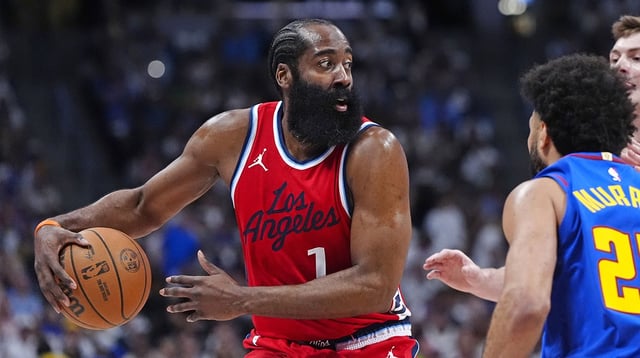 May 3, 2025; Denver, Colorado, USA; LA Clippers guard James Harden (1) prepares to pass the ball in the second quarter against the Denver Nuggets during game seven of first round for the 2025 NBA Playoffs at Ball Arena. Mandatory Credit: Ron Chenoy-Imagn Images