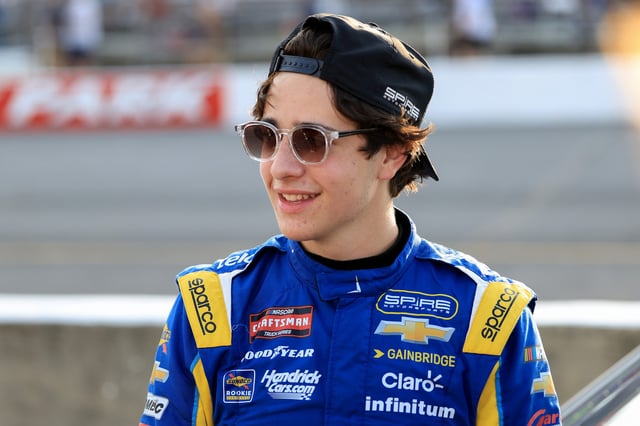 Andres Perez De Lara, driver of the #77 Telcel Chevrolet, waits on the grid prior to the NASCAR Craftsman Truck Series TSport 200 at Lucas Oil Indianapolis Raceway Park on July 25, 2025 in Indianapolis, Indiana.