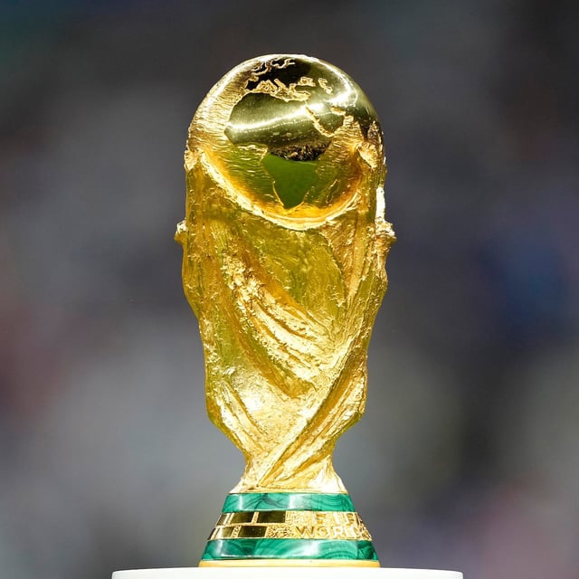 FILE - The trophy is displayed on the pitch ahead of the World Cup final soccer match between Argentina and France at the Lusail Stadium in Lusail, Qatar, Dec. 18, 2022. (AP Photo/Martin Meissner, File)