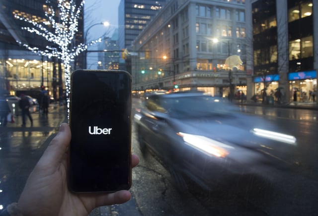 The Uber App is pictured on a smartphone in downtown Vancouver, B.C., Monday, December 30, 2019.