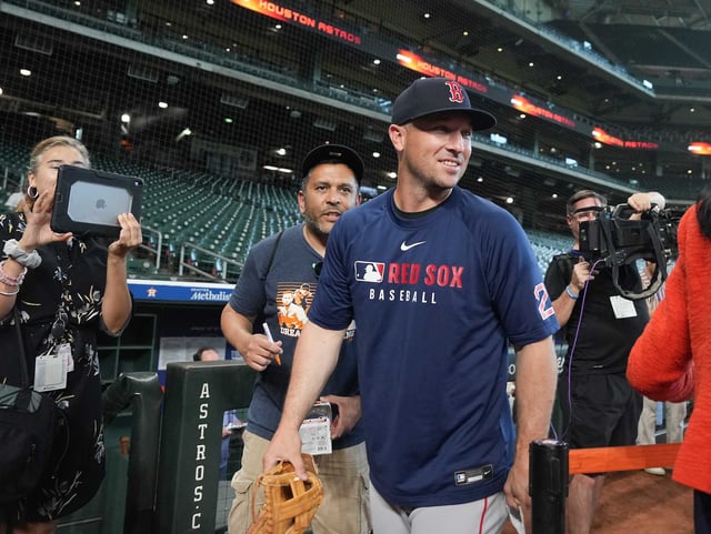 Former Houston Astros Alex Bregman leaves the dugout after chatting with the media in the vistor dugout before the Astros host the Boston Red Sox at Daikin Park in Houston on Monday, Aug. 11, 2025.