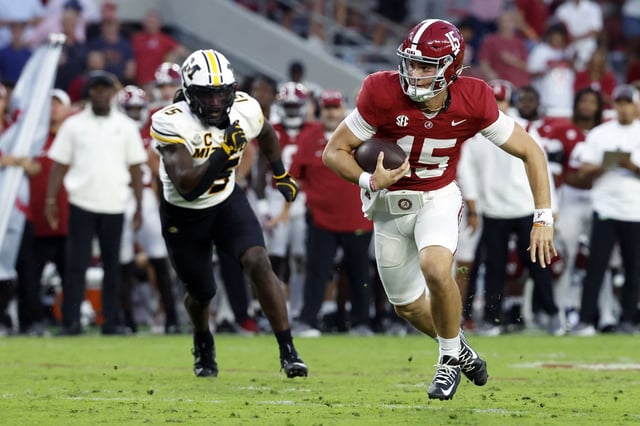 Oct 26, 2024; Tuscaloosa, Alabama, USA;  Alabama Crimson Tide quarterback Ty Simpson (15) scrambles for a first down against the Missouri Tigers during the second half at Bryant-Denny Stadium. Mandatory Credit: Butch Dill-Imagn Images/File Photo