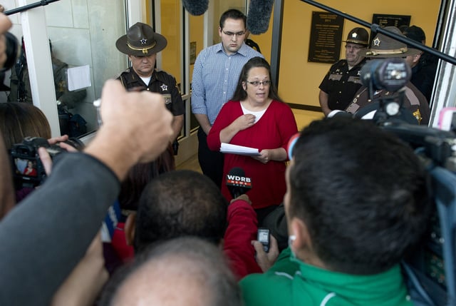 MOREHEAD, KY - SEPTEMBER 14:   Rowan County clerk Kim Davis gives a statement  about  her intentions on applying her signature to same sex marriage licenses on her first day back to work, after being released from jail last week, at the Rowan County Courthouse September 14, 2015 in Morehead, Kentucky. Davis was jailed for disobeying a judges order for denying marriage licenses to gay couples on the basis of her religious faith. (Photo by Ty Wright/Getty Images)