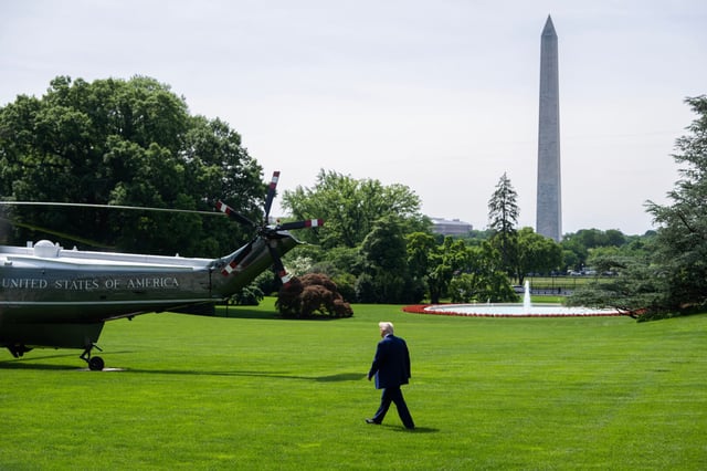 President Donald Trump is seen on the South Lawn of the White House before boarding Marine One on May 12.