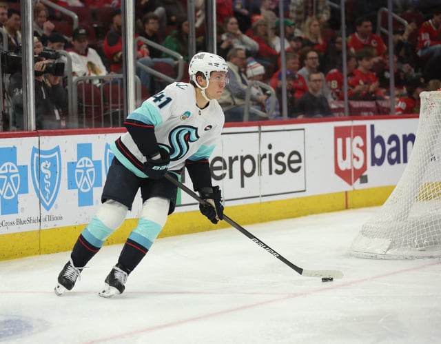 Mar 18, 2025; Chicago, Illinois, USA; Seattle Kraken defenseman Ryker Evans (41) skates with the puck during the third period against the Chicago Blackhawks at United Center. Mandatory Credit: Talia Sprague-Imagn Images/File Photo