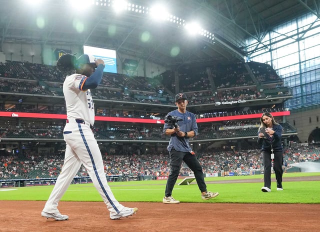 Houston Astros pitcher Cristian Javier (53) heads to the bullpen to warm up before starting against the Boston Red Sox at Daikin Park in Houston on Monday, Aug. 11, 2025.
