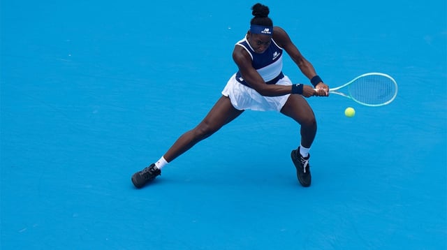 Coco Gauff, of the United States, returns to Xinyu Wang, of China, during the Cincinnati Open at the Lindner Family Tennis Center in Mason, Ohio, on Aug. 10, 2025.