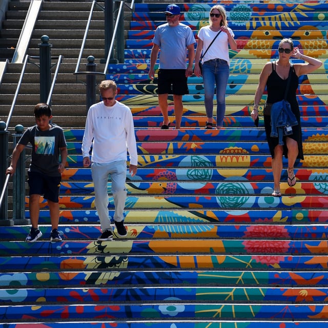 People make their way through downtown Ottawa on Monday, July 28, 2025, while temperatures hit 33 degrees. THE CANADIAN PRESS/Sean Kilpatrick